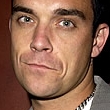 Robbie Williams: preferira ser futbolista a cantante