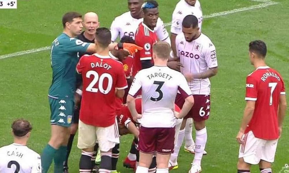 Dibu Martínez y Cristiano Ronaldo